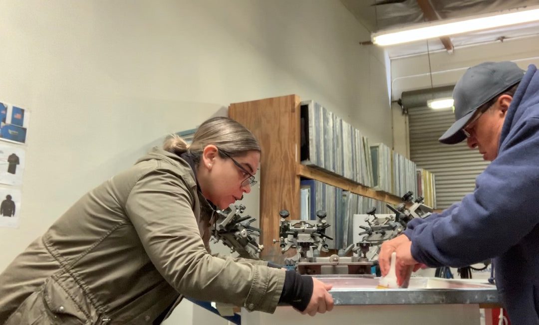 Dad and daughter working on a project