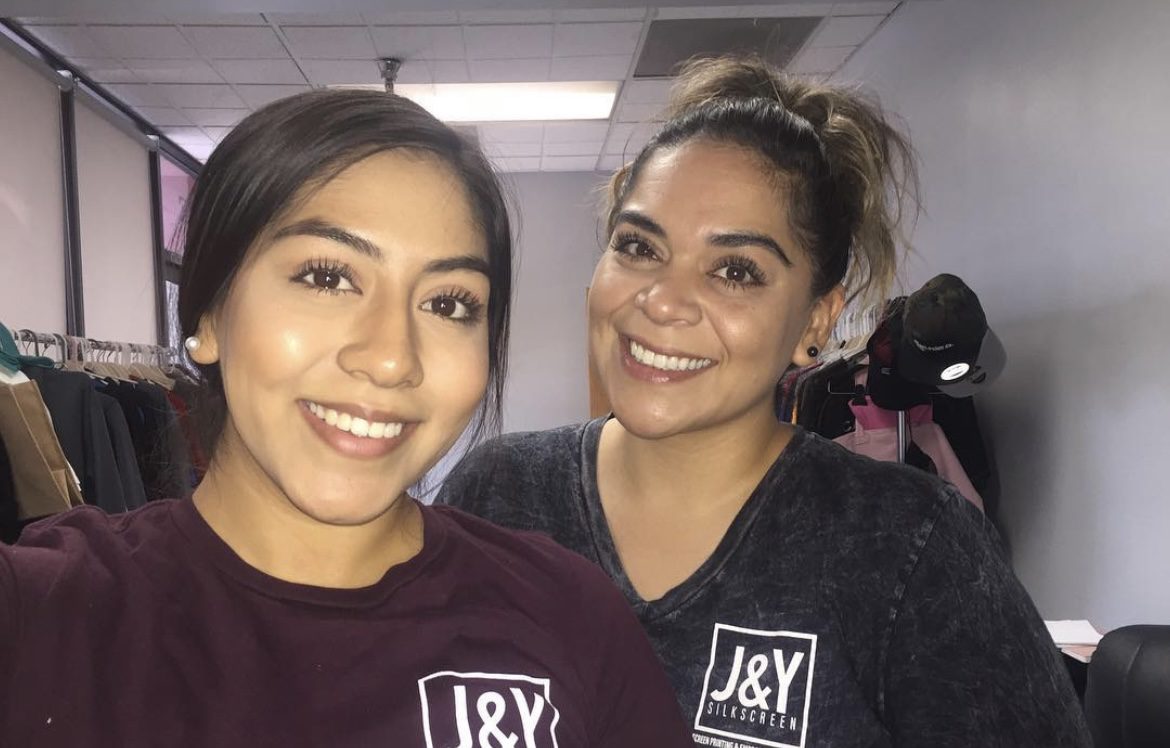 A picture of two beautiful women smiling