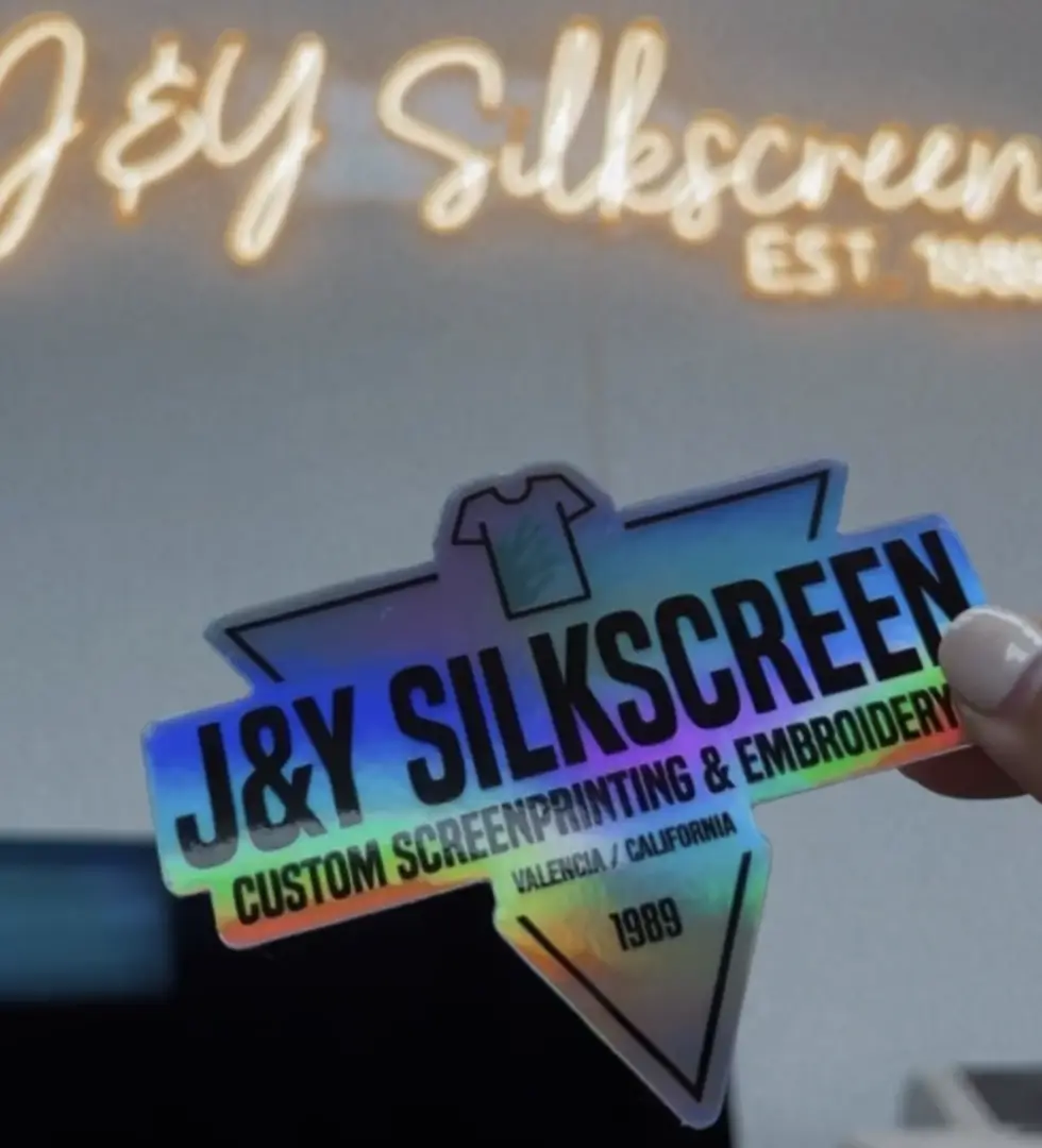 a LONG SHOT OF THE J and Y LOGO STICKER