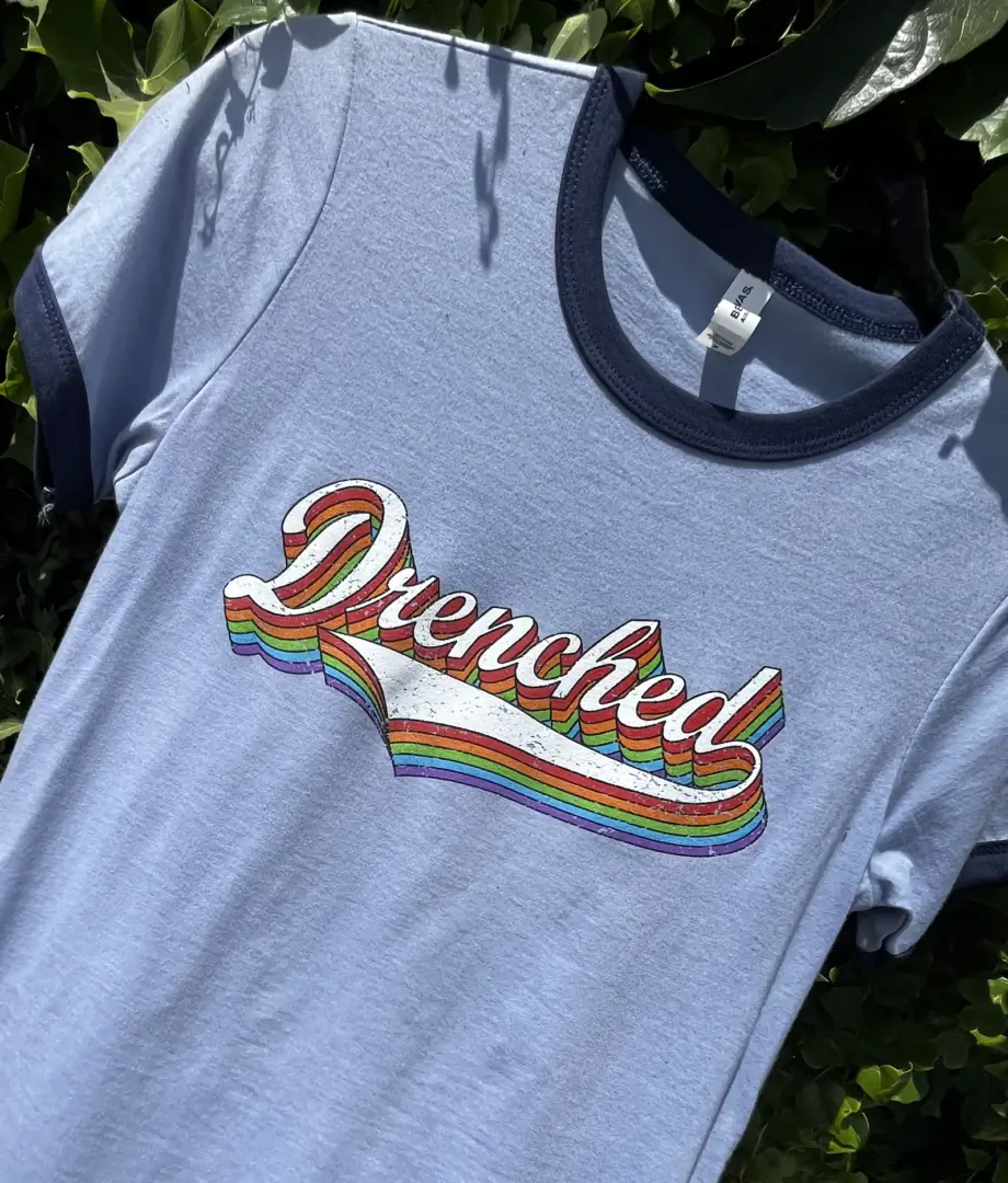 A long shot of the white t-shirt on the hanger